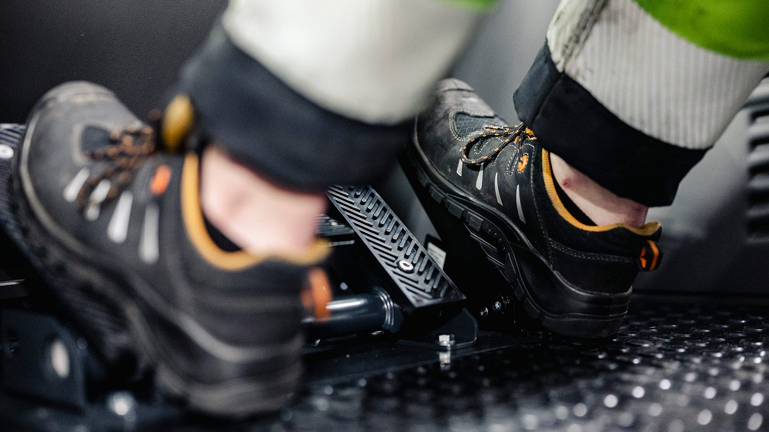 Feet on pedals in Konecranes truck